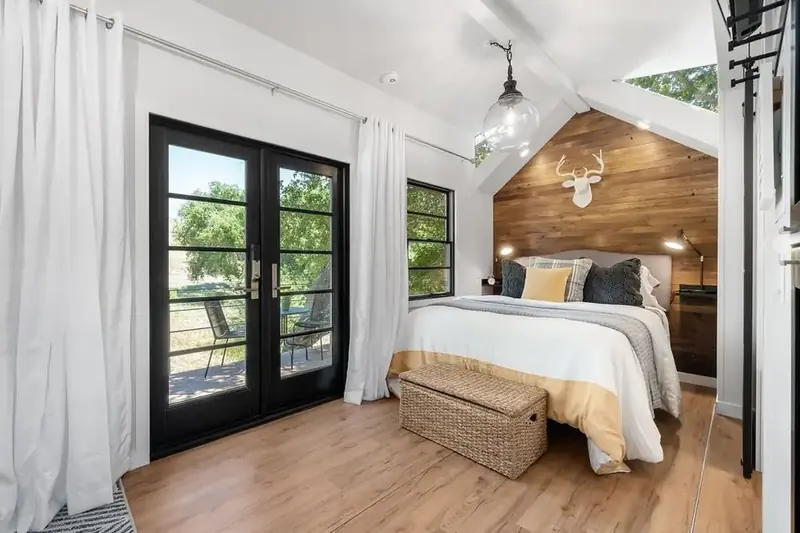 Luxury Master Sleeping Quarter with Natural Wood Accent Wall