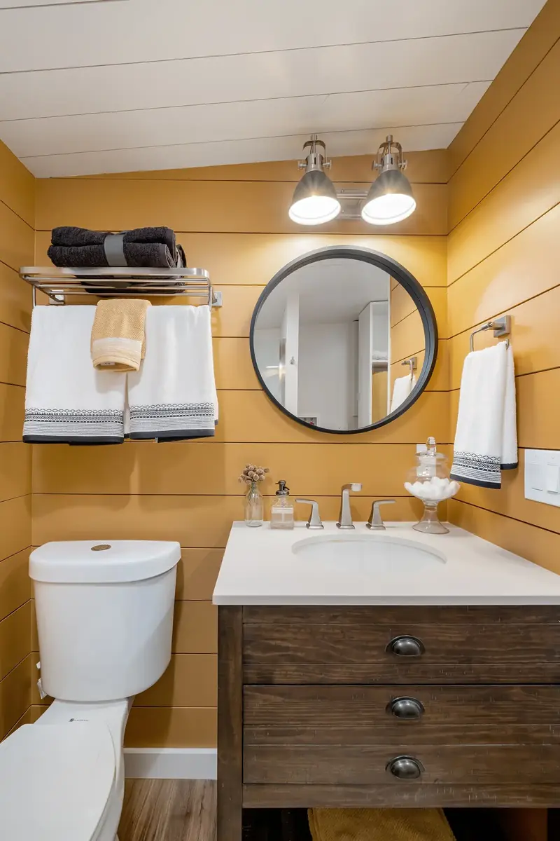 Sleek Wet Bath — Mustard Accents & Round Mirror