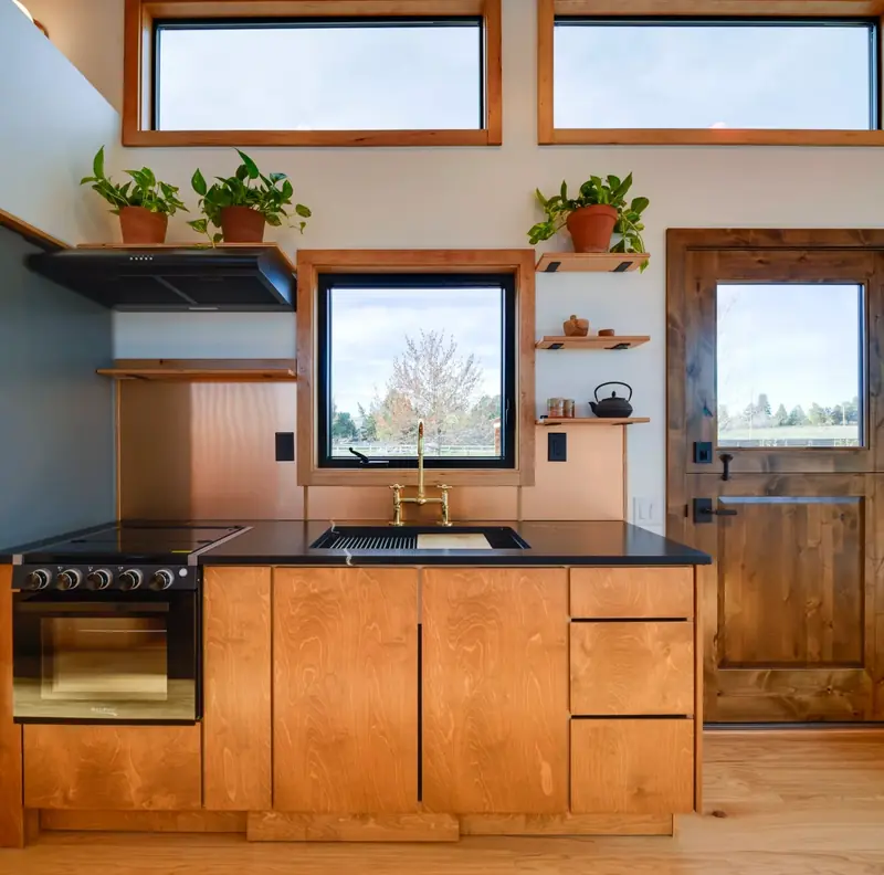 High End Prefab Cabin Living Room with Expansive Panoramic Window Views