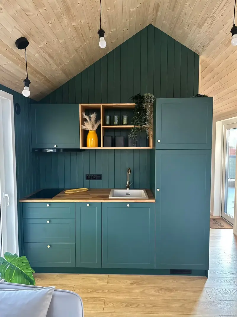 Minimalist Tiny House Living Area with Geometric Panoramic Window Views