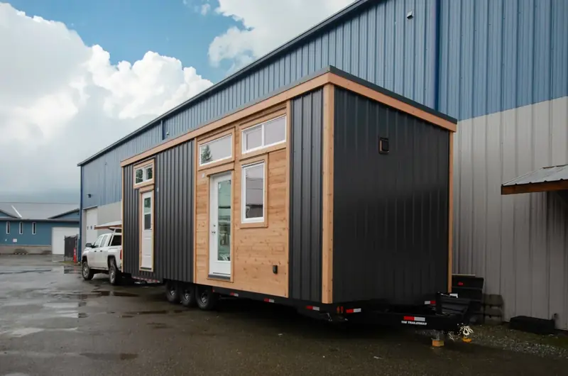 Aura Tiny Homes White Minimalist and Warm Oak Luxury Modular Villa Exterior