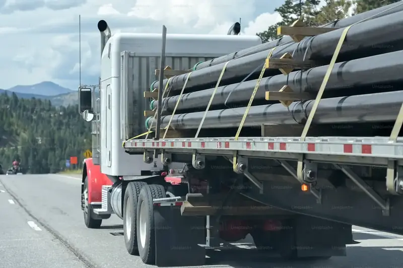 Aura Tiny Homes Flatbed Freight Delivery – Heavy Commercial Semi-Truck Transporting Luxury Prefab Modular Home Nationwide from Waco TX